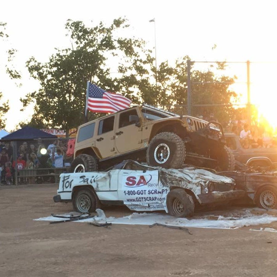 Climbing over a car at an event