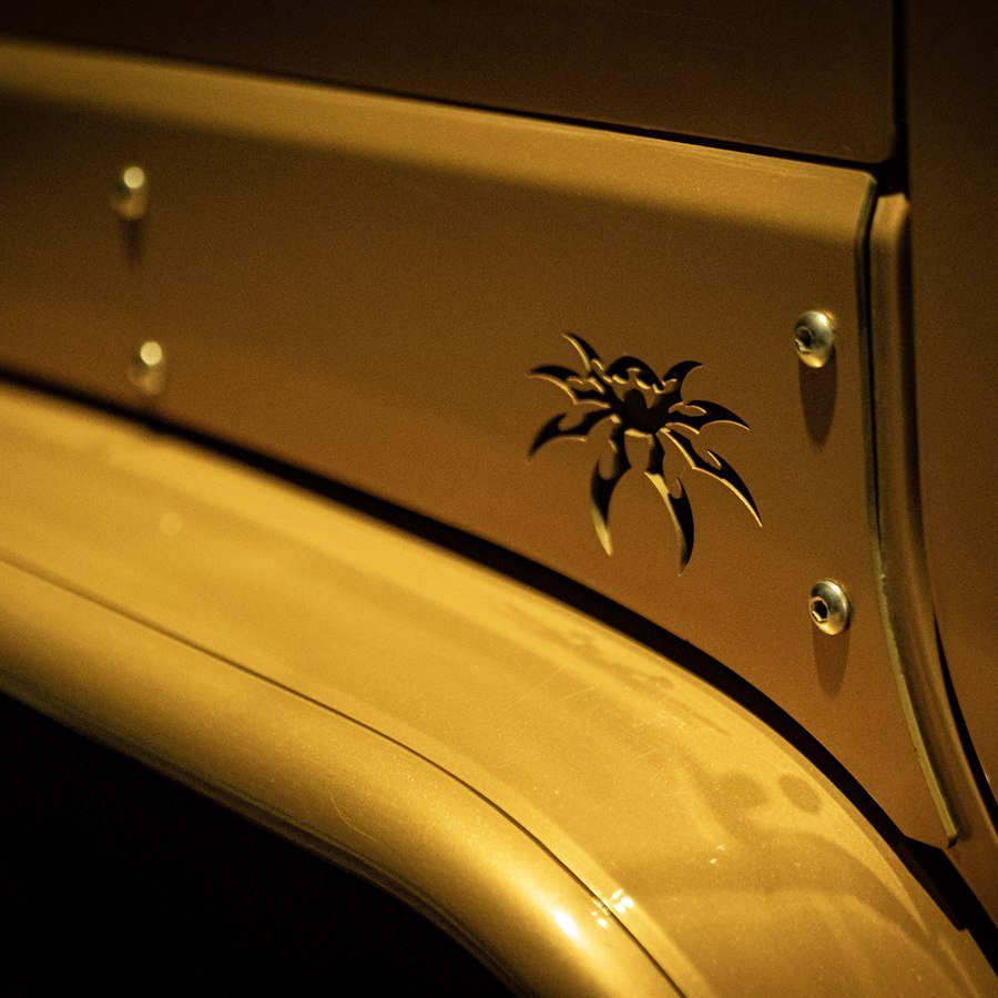 Poison Spyder armor with cutout spider logo